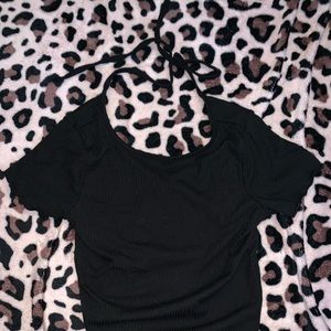 I am selling this top. It ties in the back and is very cute for anything !!!